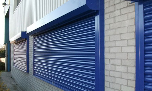 Commercial storefront security gate installation